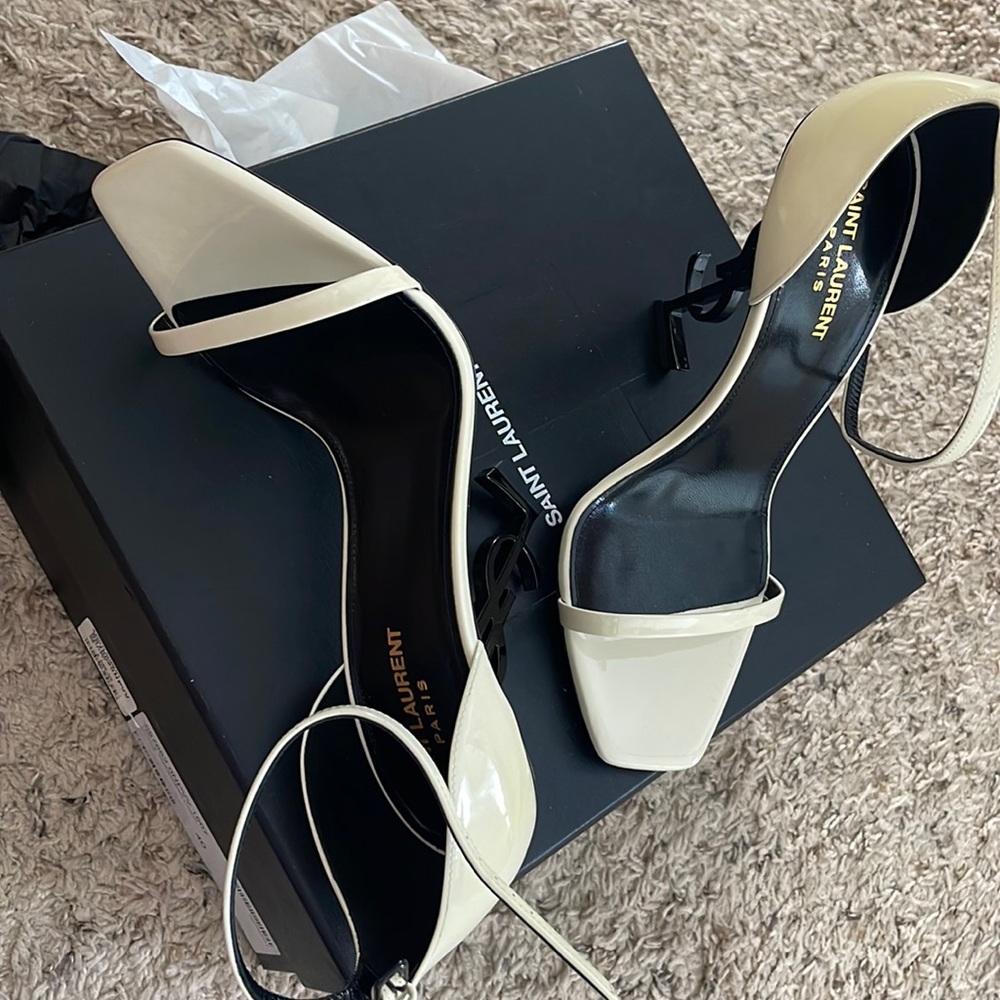 Brand new YSL sandals never wear, size 10 going $995